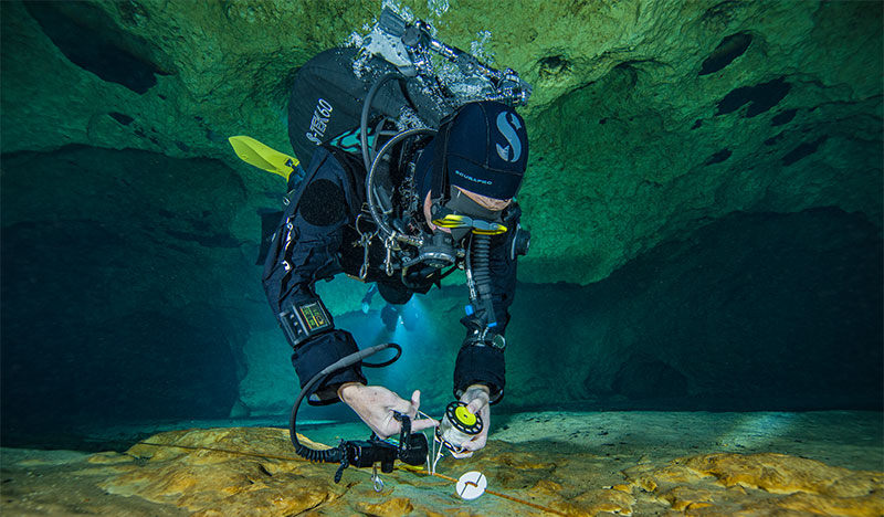 scuba diver cave diving with scubapro s tek gear