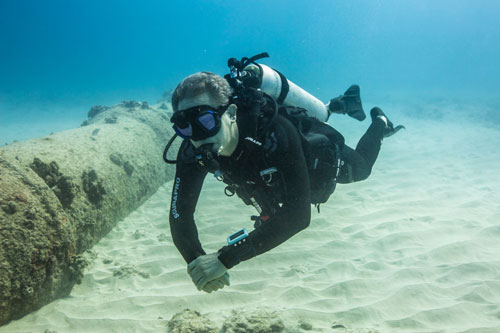 Diver underwater wearing a Hydros X BCD